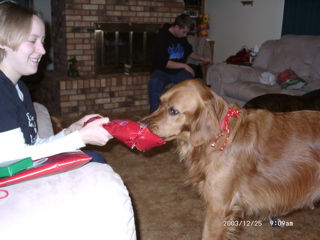 Nigel opening gifts