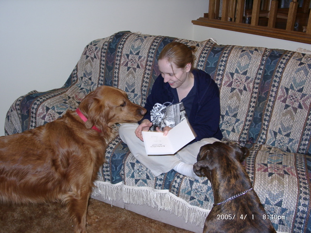 Nigel and Puck helping with the presents