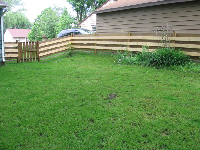 We stained the fence in June... this is how it looked before