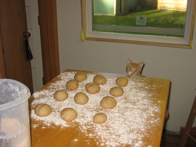 Niko helps make pita bread